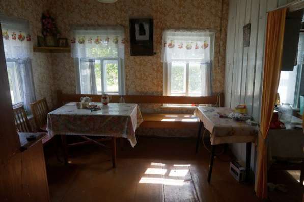 Бревенчатый дом в жилой деревне в Москве фото 14