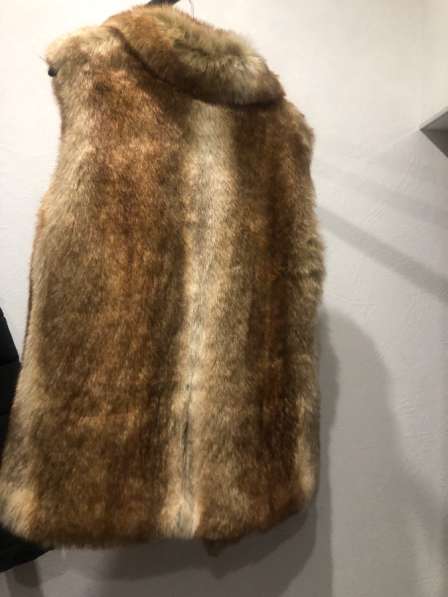 Жилетка теплая