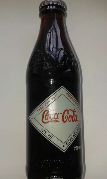 Коллекционные бутылки Coca-Cola в фото 3