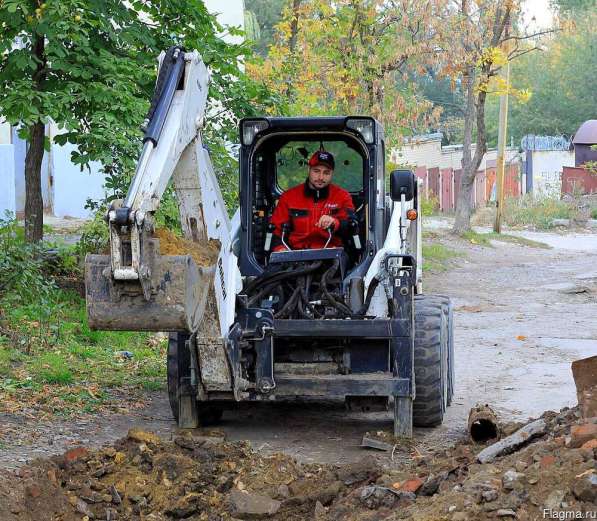 Аренда мини-погрузчика Bobcat с навесным экскаватором в Саратове