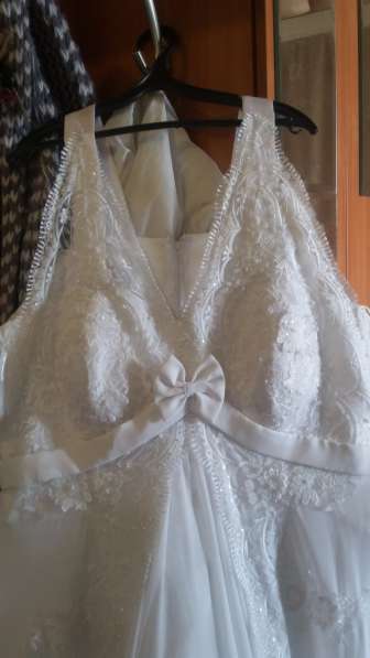 Шуба мутоновая, свадебное платье в Перми фото 7