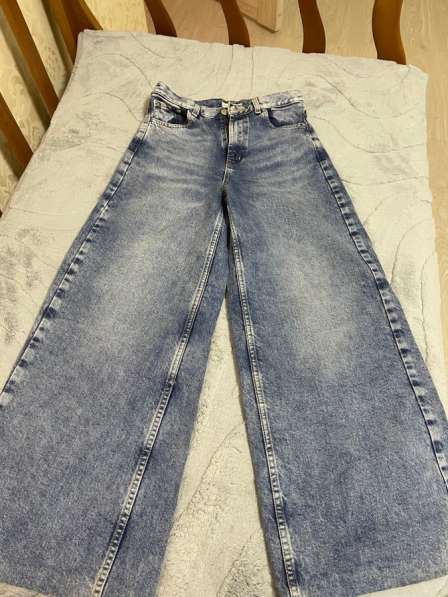 Джинсы широкие