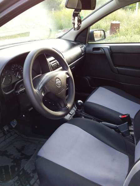 Opel Astra в фото 13