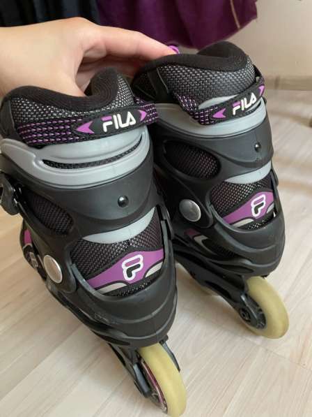 Роликовые коньки