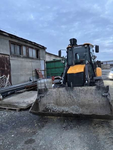 Услуги экскаватора-погрузчика