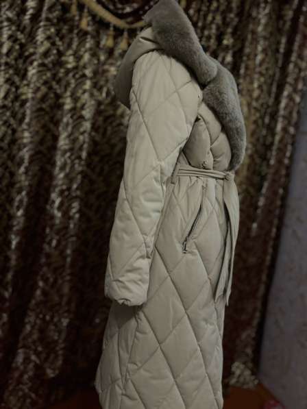 Продам пуховик в фото 7
